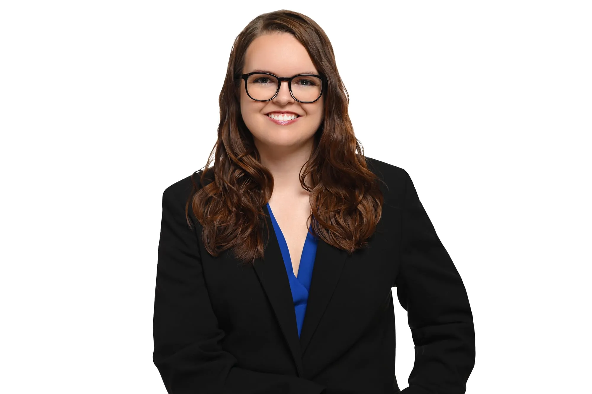 ERAS-ready medical residency headshot: black blazer, blue top, and glasses, white background