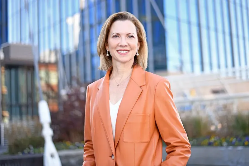 Professional outdoor headshots Denver — city backdrop portrait session Christina Cookson